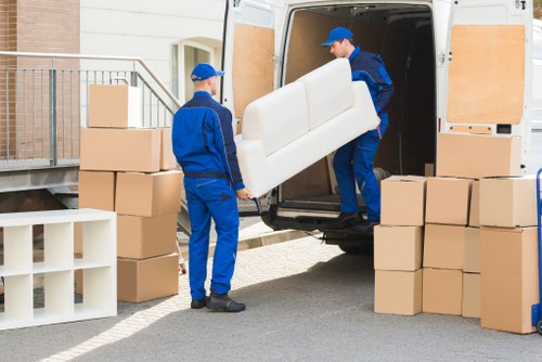 Professional movers handling furniture in Hornchurch