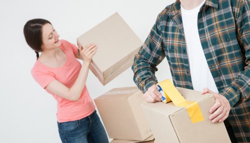 Professional movers loading furniture for a local Hornchurch relocation