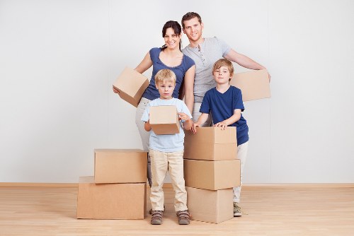 Loading furniture into a moving van in Hornchurch