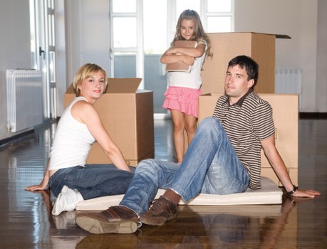 Packed boxes and furniture ready for transport in Hornchurch